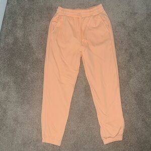 High waisted Fabletics sweatpants - size small - pastel orange